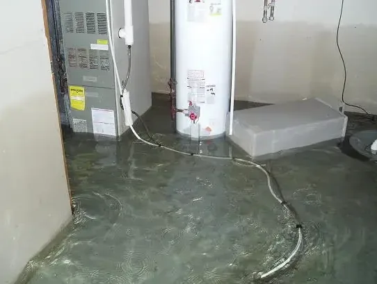 Water across the floor around a heater in a utility space